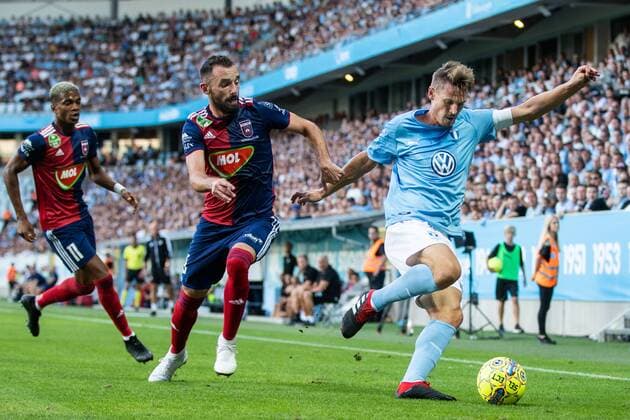 180807 Attila Fiola of Vidi and Markus Rosenberg of Malmö FF competes for the ball during the UEFA Champions League qualifying match between Malmö FF and Vidi on August 7, 2018 in Malmö Photo Mathilda Ahlberg BILDBYRAN Cop 178  Copyright: MATHILDAxAHLBERG BB180807MA044