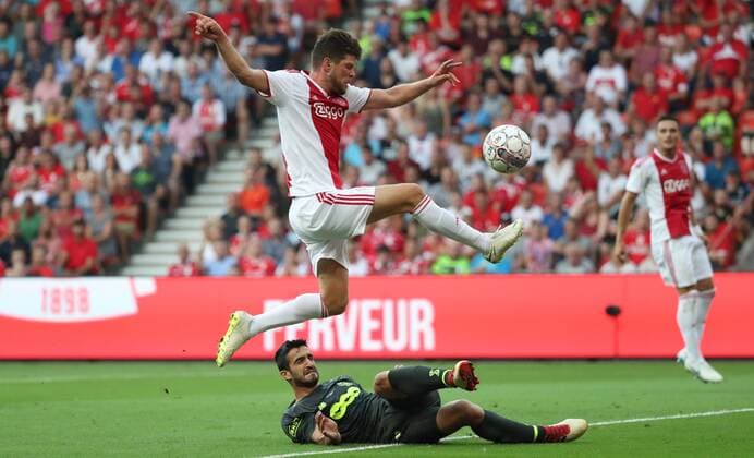 Standard s Konstantinos Laifis and Ajax Klaas-Jan Huntelaar fight for the ball during the soccer match between Belgian Standard de Liege and Dutch AFC Ajax Amsterdam, Tuesday 07 August 2018 in Liege. This is the first leg of the third qualifying round of the UEFA Champions League. VIRGINIExLEFOUR  x05400381x