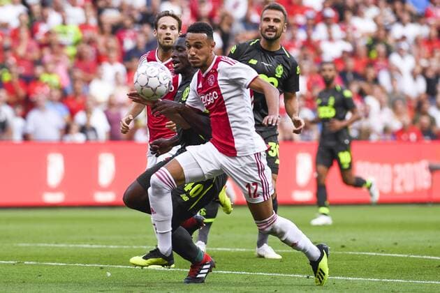 Ajax Noussair Mazraoui and Standard s Paul-Jose Mpoku M Poku Ebunge fight for the ball during the soccer match between Belgian Standard de Liege and Dutch AFC Ajax Amsterdam, Tuesday 07 August 2018 in Liege. This is the first leg of the third qualifying round of the UEFA Champions League. LAURIExDIEFFEMBACQ  x05400402x