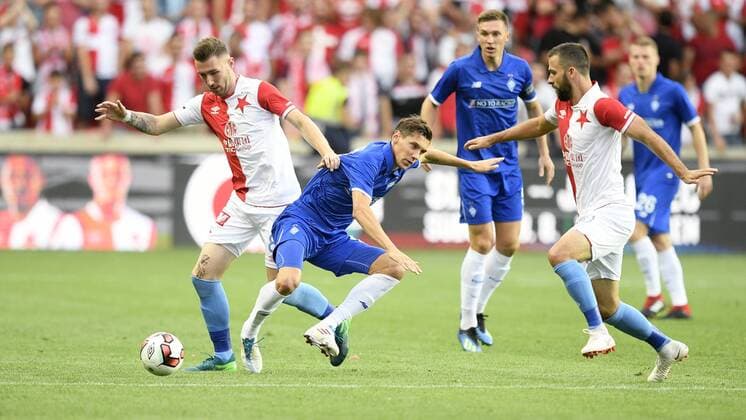 From left Jaromir Zmrhal of Slavia, Vitaliy Buyalskyi of Dynamo Kiev and Josef Husbauer of Slavia Praha in action during the 3rd qualifying round of football Champions League, first match in Prague, Czech Republic, August 7, 2018. (CTKxPhoto OndrejxDeml) CTKPhotoP201808070879001  _DML7998