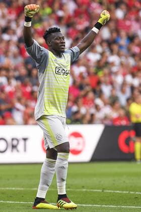 Ajax goalkeeper Andre Onana celebrates after scoring during the soccer match between Belgian Standard de Liege and Dutch AFC Ajax Amsterdam, Tuesday 07 August 2018 in Liege. This is the first leg of the third qualifying round of the UEFA Champions League. LAURIExDIEFFEMBACQ  x05400431x