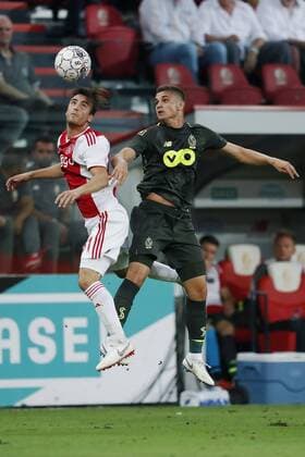 LIEGE, 07-08-2018 , Stadium Maurice Dufrasne, football season 2018 2019, UEFA Champions League third qualifying round, 1st leg , Ajax player Nico Tagliafico (L) and Standard player Razvan Marin (R) during the game Standard Luik - Ajax Standard Luik - Ajax  x2382436x