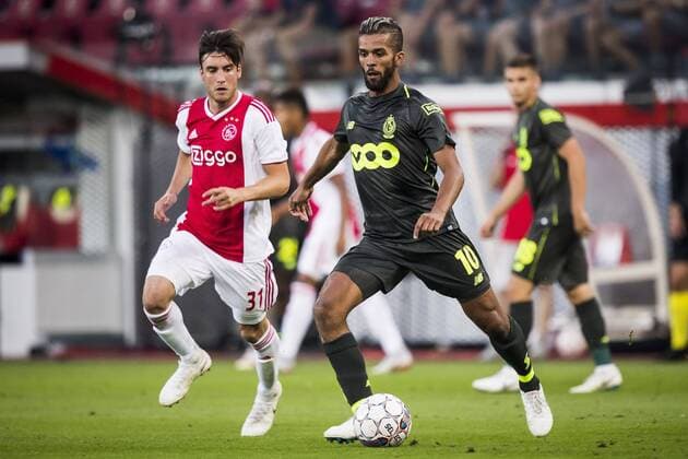 LIEGE, Standard Luik - Ajax, 7-8-2018, football, season 2018-2019, third round qualification match for Champions League, Maurice Dufrasne stadium, Standard Liege player Mehdi Carcela (M), Ajax player Nico Tagliafico (L) Standard Luik - Ajax  x2382439x