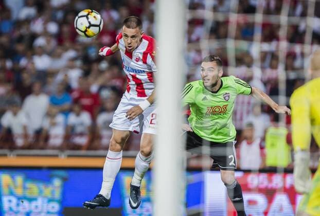 7th August 2018, Rajko Mitic Stadium, Belgrade, Serbia; UEFA Champions League football, third qualifying round, 1st leg, Red Star Belgrade versus Spartak Trnava; Milan Rodic of Red Star Belgrade competes in the air against Andrej Kadlec of Spartak Trnava  ActionPlus12053843 NikolaxKrstic