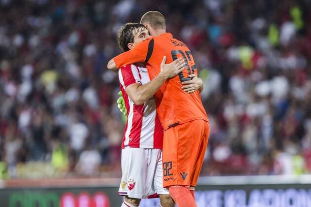 7th August 2018, Rajko Mitic Stadium, Belgrade, Serbia; UEFA Champions League football, third qualifying round, 1st leg, Red Star Belgrade versus Spartak Trnava; Filip Stojkovic of Red Star Belgrade hugs Goalkeeper Milan Borjan of Red Star Belgrade  ActionPlus12053863 NikolaxKrstic