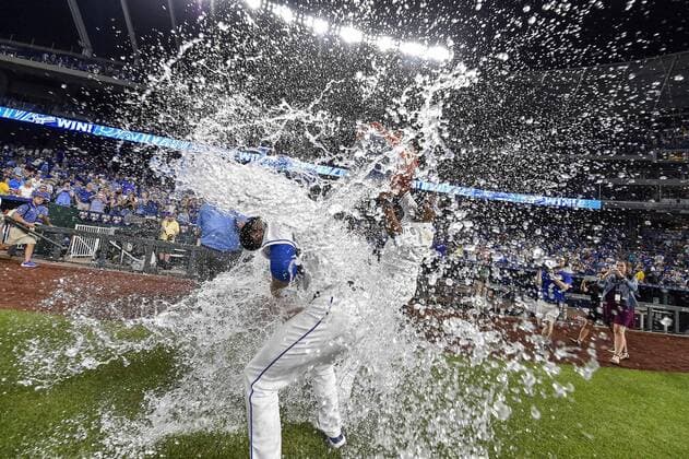August 8, 2018 - Kansas City, MO, USA - Kansas City Royals starting pitcher Heath Fillmyer gets the Salvy Splash from Salvador Perez after a 9-0 win against the Chicago Cubs on Wednesday, Aug. 8, 2018, at Kauffman Stadium in Kansas City, Mo. The Royals won, 9-0. Chicago Cubs at Kansas City - ZUMAm67_ 20180808_zaf_m67_039 Copyright: xJohnxSleezerx