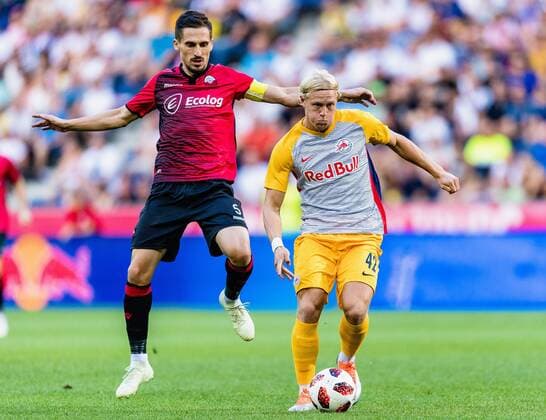 08.08.2017 Red Bull Arena Salzburg UEFA Champions League Final UEFA Champions League Qualification 3 Round First leg im Bild vl Armend Alimi KF Shkendija Tetovo Xaver Schlager FC Salzburg during UEFA Champions League Qualifier 3rd round 1st leg match between FC Salzburg and KF Shkendija Tetovo at the Red Bull Arena in Salzburg Austria on 2018 08 08 Salzburg  EX_ADE