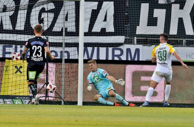 SOCCER - UEFA EL quali, Sturm vs Larnaca GRAZ,AUSTRIA,09.AUG.18 - SOCCER - UEFA Europa League qualification, SK Sturm Graz vs AEK Larnaca. Image shows Lukas Spendlhofer (Sturm), Joerg Siebenhandl (Sturm) and Apostolos Giannou (Larnaca). GEPAxpictures xHansxOberlaender