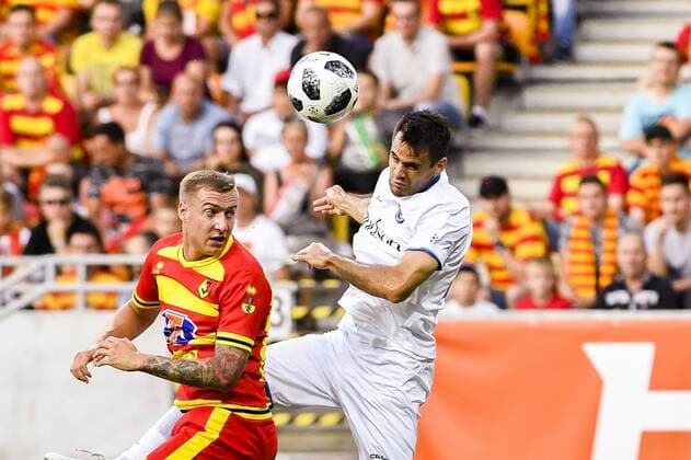 Jagiellonia s Bartosz Kwiecien and Gent s Franko Andrijasevic fight for the ball during a soccer game between Polish team Jagiellonia Bialystok and Belgian club KAA Gent, Thursday 09 August 2018 in Bialystok, Poland, the first leg of the third qualification round for the Europa League competition. LAURIExDIEFFEMBACQ  x05402067x
