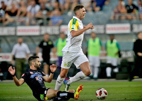 SOCCER - UEFA EL quali, Sturm vs Larnaca GRAZ,AUSTRIA,09.AUG.18 - SOCCER - UEFA Europa League qualification, SK Sturm Graz vs AEK Larnaca. Image shows Anastasios Avlonitis (Sturm) and Apostopolos Giannou (Larnaca). GEPAxpictures xHansxOberlaender