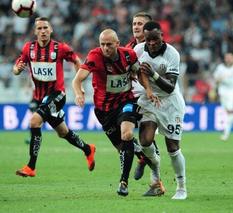 Cyle Larin of Besiktas and Gernot Trauner of LASK Linz during the UEFA Europa League Qualifying match between Besiktas and LASK Linz at Vodafone Park in Istanbul , Turkey on August 09, 2018. 