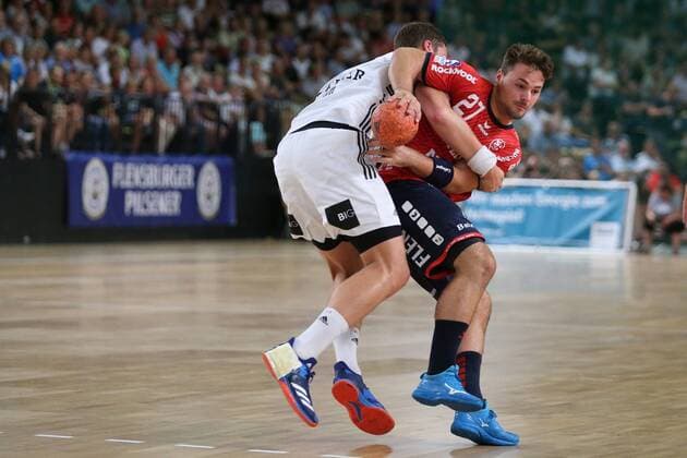 SG Flensburg Handewitt vs THW Kiel Handball Test match 09 08 18 Dani Baijens SG Flensburg Handewitt 27 against Hendrik Pekeler THW Kiel 61 xmmkx