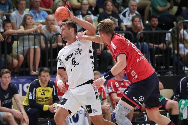 SG Flensburg Handewitt vs THW Kiel Handball Test match 09 08 18 Harald Reinkind THW Kiel 06 against Simon Jeppsson SG Flensburg Handewitt 17 xmmkx