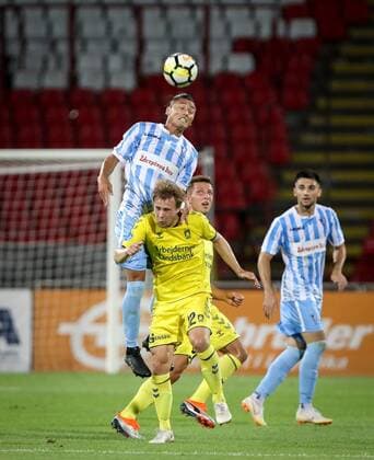 (180810) -- BELGRADE , Aug. 10, 2018 -- Spartak s Noboru Shimura (Top) vies with Brondby s Simon Tibbling during UEFA Europa League third qualifying round football match between Spartak Subotica and Brondby in Belgrade, Serbia on Aug. 9. 2018. Brondby won 2-0. ) (SP)SERBIA-BELGRADE-FOOTBALL-UEFA-EUROPA LEAGUE-QUALIFICATIONS PredragxMilosavljevic 