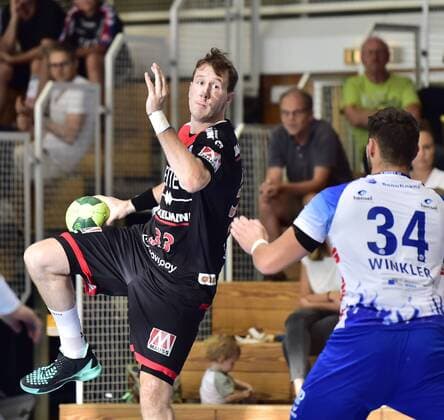 Nikolai Link 33 HC Erlangen HCE Jan Winkler 34 TV Großwallstadt
