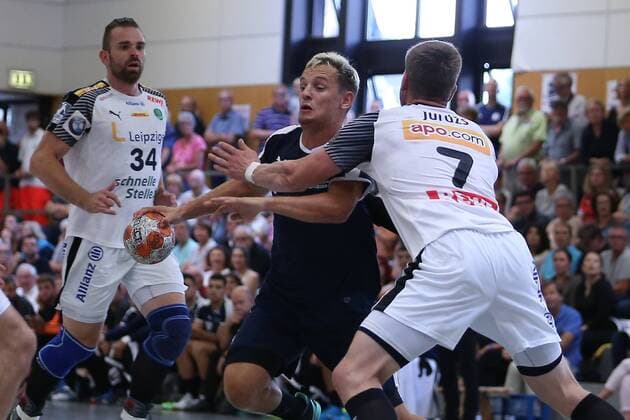 SC DHfK Leipzig vs MHB Montpellier Handball Handball International Heide Cup 2018 10 08 18 Jean Loup Faustin No 25 MHB Montpellier Handball against Aivis Jurdzs Nr 07 SC DHfK Leipzig xmmkx