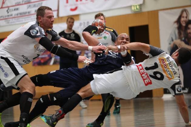 SC DHfK Leipzig vs MHB Montpellier Handball Handball Internationaler Heide Cup 2018 10 08 18 Mohamed Shebib Nr 89 MHB Montpellier Handball against Bastian Roschek Nr 19 SC DHfK Leipzig and Aivis Jurdzs Nr 07 SC DHfK Leipzig xmmkx