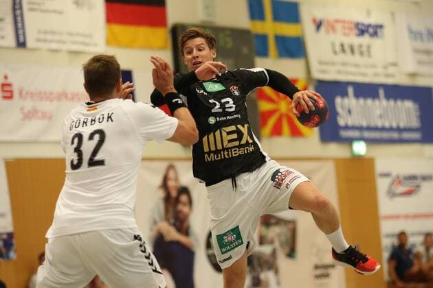 Handball Sportverein Hamburg vs HC Varder Skopje Handball International Heide Cup 2018 10 08 18 Jan Forstbauer Nr 23 Handball Sport Club Hamburg against Sergei Gorbok No 32 HC Vardar Skopje xmmkx