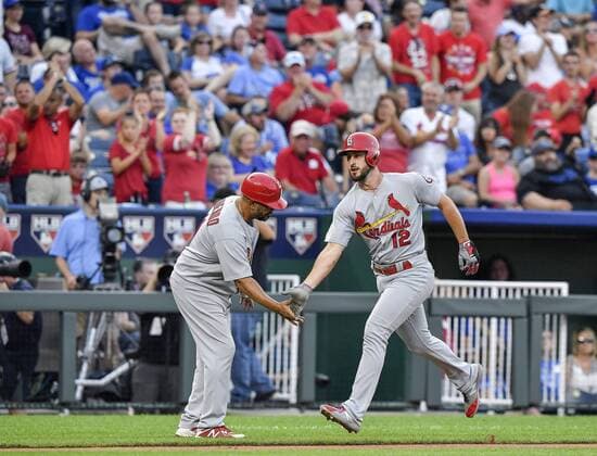 August 10, 2018 - Kansas City, MO, USA - The St. Louis Cardinals Paul DeJong (12) is congratulated by third base coach Jose Oquendo as DeJong rounds third on a solo home run in the second inning off Kansas City Royals starting pitcher Burch Smith on Friday, Aug. 10, 2018, at Kauffman Stadium in Kansas City, Mo. St. Louis at Kansas City - ZUMAm67_ 20180810_zaf_m67_020 Copyright: xJohnxSleezerx