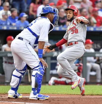 August 11, 2018 - Kansas City, MO, USA - The St. Louis Cardinals Jose Martinez scores in front of Kansas City Royals catcher Salvador Perez on a triple by Marcell Ozuna in the third inning on Saturday, Aug. 11, 2018, at Kauffman Stadium in Kansas City, Mo. St. Louis at Kansas City - ZUMAm67_ 20180811_zaf_m67_017 Copyright: xJohnxSleezerx