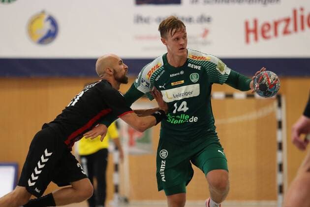 HC Varder Skopje vs SC DHfK Leipzig Handball International Heide Cup 2018 12 08 18 Niclas Pieczkowski No 14 SC DHfK Leipzig v Timur Dibirov No 31 HC Vardar Skopje xmmkx