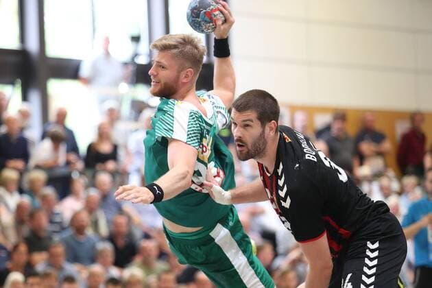 HC Varder Skopje vs SC DHfK Leipzig Handball International Heide Cup 2018 12 08 18 Maciej Gebala No 28 SC DHfK Leipzig against Vuko Borozan Nr 34 HC Vardar Skopje xmmkx