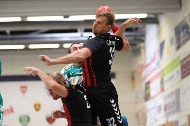 HC Varder Skopje vs SC DHfK Leipzig Handball International Heide Cup 2018 12 08 18 Sergei Gorbok No 32 HC Vardar Skopje and Stas Scube No 20 HC Vardar Skopje against Bastian Roschek No 19 SC DHfK Leipzig xmmkx