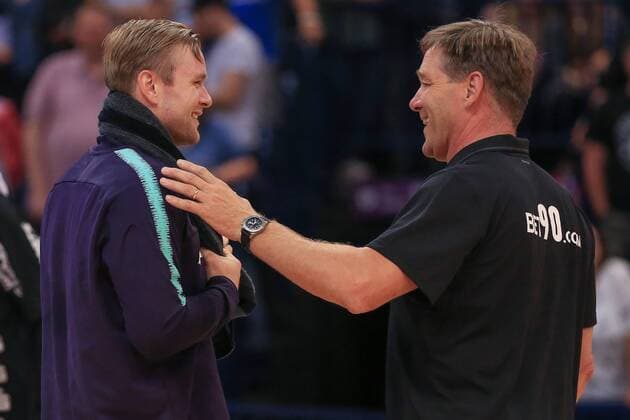 Germany Hamburg Barclaycard Arena Handball Heroes of the Handball THW Kiel FC Barcelona coach Alfred Gislason THW claps with Aron Palmarsson FC B from
