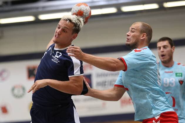 MHB Montpellier vs Füchse Berlin Handball International Heide Cup 2018 12 08 18 Jean Loup Faustin No 25 MHB Montpellier Handball against Paul Drux Fuechse Berlin 95 xmmkx