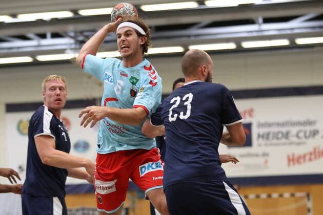 MHB Montpellier vs Fuechse Berlin Handball International Heath Cup 2018 12 08 18 Jacob Tandrup Holm No. 06 Fuechse Berlin v Vid Kavticnik No. 23 MHB Montpellier Handball and Frederik Pettersson No. 18 MHB Montpellier Handball xmmkx