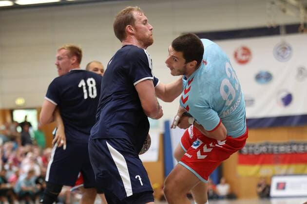 MHB Montpellier vs Füchse Berlin Handball Internationaler Heide Cup 2018 12 08 18 Mijajlo Marsenic Nr 93 Fuechse Berlin v Jonas Truchanovicius Nr 07 MHB Montpellier Handball xmmkx
