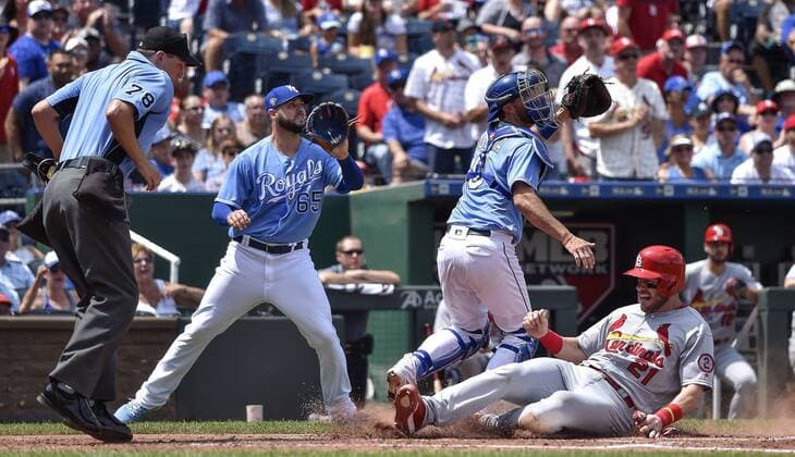 August 12, 2018 - Kansas City, MO, USA - St. Louis Cardinals Patrick Wisdom slides into home ahead of the throw to Kansas City Royals catcher Drew Butera on a single by Jose Martinez in the third inning on Sunday, Aug. 12, 2018 at Kauffman Stadium in Kansas City, Mo. It was Wisdom s first time scoring in the majors. St. Louis Cardinals vs. Kansas City Royals - ZUMAm67_ 20180812_zaf_m67_011 Copyright: xJohnxSleezerx