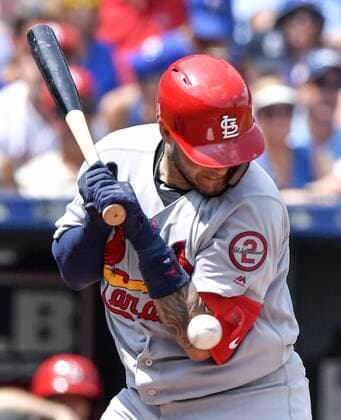 August 12, 2018 - Kansas City, MO, USA - St. Louis Cardinals Yadier Molina is hit by a pitch from Kansas City Royals starting pitcher Jakob Junis in the third inning on Sunday, Aug. 12, 2018 at Kauffman Stadium in Kansas City, Mo. St. Louis Cardinals vs. Kansas City Royals - ZUMAm67_ 20180812_zaf_m67_013 Copyright: xJohnxSleezerx