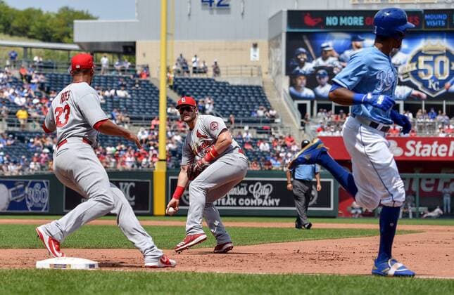 August 12, 2018 - Kansas City, MO, USA - Kansas City Royals Rosell Herrera reaches first before St. Louis Cardinals first baseman Patrick Wisdom could toss the ball to starting pitcher Tyson Ross in the first inning on Sunday, Aug. 12, 2018 at Kauffman Stadium in Kansas City, Mo. Wisdom was charged with an error on the play which allowed Alex Gordon to score. St. Louis Cardinals vs. Kansas City Royals - ZUMAm67_ 20180812_zaf_m67_027 Copyright: xJohnxSleezerx