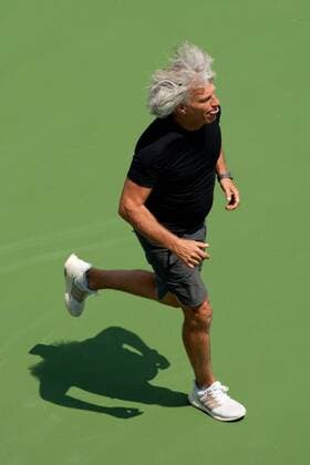 August 12, 2018 - Cincinnati, OH, USA - Western and Southern Open Tennis, Cincinnati, OH - August 12, 2018 - Sergio Giorgi, the coach of Camila Giorgi, runs off the court after Camila consulted with him during a break; in a game against Viktoria Kuzmova in the qualifiers for the Western and Southern Tennis tournament held in Cincinnati. - ZUMA Press World News - August 12, 2018 - ZUMAn24_ 20180812_zaf_n24_027 Copyright: xWallyxNellx