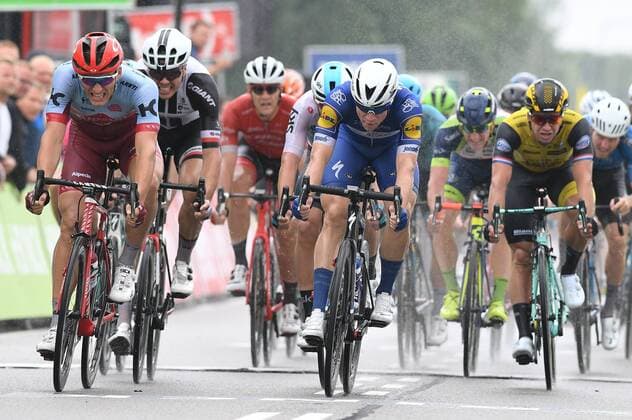 Dutch Fabio Jakobsen of Quick-Step Floors (C) wins before German Marcel Kittel of Katusha-Alpecin (L) the sprint at the finish of the first stage of the Binkcbank Tour cycling race, 177,3km km from Heerenveen to Bolsward, Monday 13 August 2018. DAVIDxSTOCKMAN  x05405054x