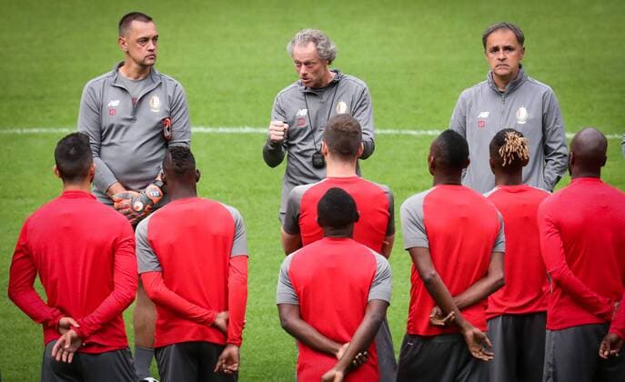 Standard s head coach Michel Preud homme (C) talks to his players during a training session of Belgian soccer team Standard de Liege, Monday 13 August 2018 in Amsterdam, the Netherlands. The team is preparing for the return leg of the third qualifying round of the UEFA Champions League against Dutch club AFC Ajax. VIRGINIExLEFOUR  x05405484x