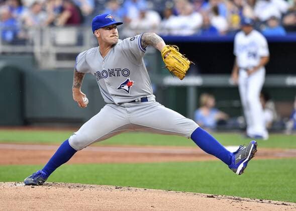 August 13, 2018 - Kansas City, MO, USA - Toronto Blue Jays starting pitcher Sean Reid-Foley works in the first inning of his major league debut, against the Kansas City Royals on Monday, Aug. 13, 2018, at Kauffman Stadium in Kansas City, Mo. Toronto at Kansas City - ZUMAm67_ 20180813_zaf_m67_045 Copyright: xJohnxSleezerx