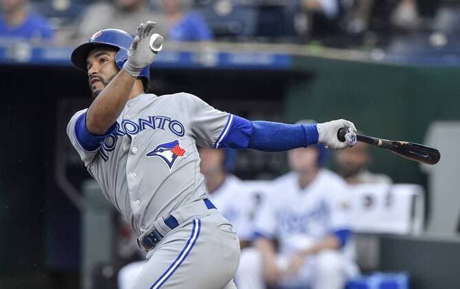August 13, 2018 - Kansas City, MO, USA - The Toronto Blue Jays Devon Travis follows through on a solo home run in the first inning against the Kansas City Royals on Monday, Aug. 13, 2018, at Kauffman Stadium in Kansas City, Mo. Toronto at Kansas City - ZUMAm67_ 20180813_zaf_m67_048 Copyright: xJohnxSleezerx