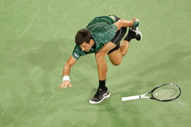 August 13, 2018 - Cincinnati, OH, USA - Western and Southern Open Tennis, Cincinnati, OH - August 13, 2018 - Novak Djokovic loses his racquet in action against Steve Johnson in the first round of the Western and Southern Tennis tournament held in Cincinnati. - ZUMA Press World News - August 13, 2018 - ZUMAn24_ 20180813_zaf_n24_061 Copyright: xWallyxNellx