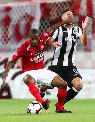 MOSCOW, RUSSIA - AUGUST 14, 2018: Spartak Moscowâ€™s Lucas Fernando (L) and PAOK Thessalonikiâ€™s Jose Mauricio in their 2018-19 UEFA Champions League third qualifying round match at Moscow s Otrkitie Arena. Stanislav Krasilnikov TASS  TS08CC0D