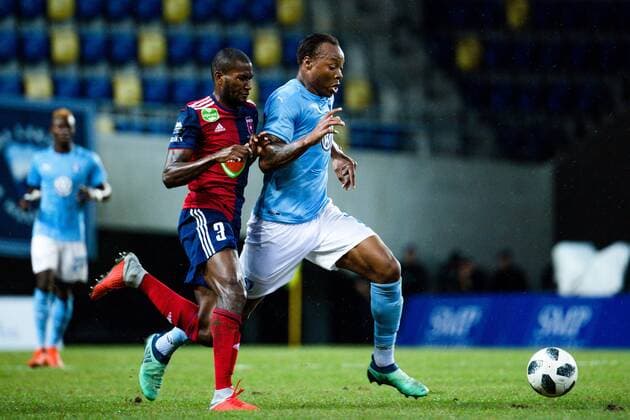 180814 Paulo Vinicius of Vidi Behrang and Carlos Strandberg of Malmö FF during the UEFA Champions League qualifying match between Vidi and Malmö FF on August 14, 2018 in Felcsut Photo Ludvig Thunman BILDBYRAN code LT 35516  Copyright: LUDVIGxTHUNMAN BB180814LT043