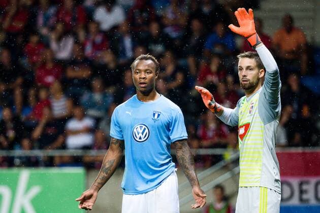 180814 Carlos Strandberg or Malmö FF and goalkeeper Stefan Scepovic or Vidi during the UEFA Champions League qualifying match between Vidi and Malmö FF on August 14, 2018 in Felcsut Photo Ludvig Thunman BILDBYR N code LT 35516  Copyright: LUDVIGxTHUNMAN BB180814LT046