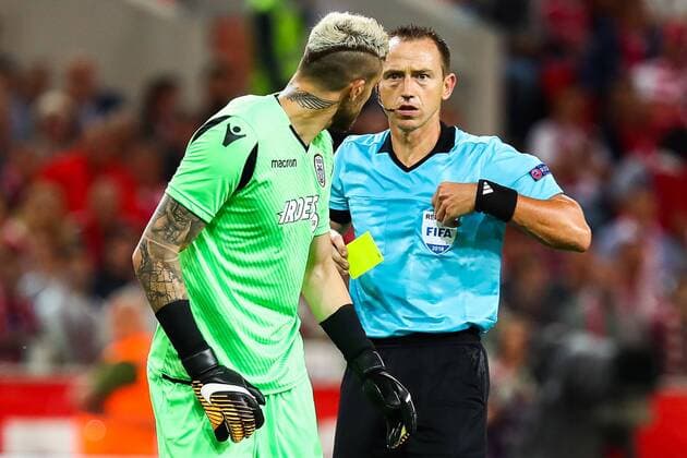 MOSCOW, RUSSIA - AUGUST 14, 2018: Referee Ruddy Buquet (R) and PAOK Thessaloniki goalkeeper Alexandros Paschalakis in their 2018-19 UEFA Champions League third qualifying round match against Spartak Moscow at Moscow s Otkritie Arena. Anton Novoderezhkin TASS  TS08CC2F