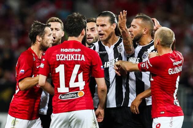 MOSCOW, RUSSIA - AUGUST 14, 2018: Spartak Moscowâ€™s Dmitry Kombarov, Georgi Dzhikiya (L-R front), Denis Glushakov (R front), PAOK Thessalonikiâ€™s Jose Canas, Jose Mauricio, Aleksandar Prijovic and Omar El Kaddouri (L-R back) in their 2018-19 UEFA Champions League third qualifying round match at Moscow s Otkritie Arena. Stanislav Krasilnikov TASS  TS08CC38