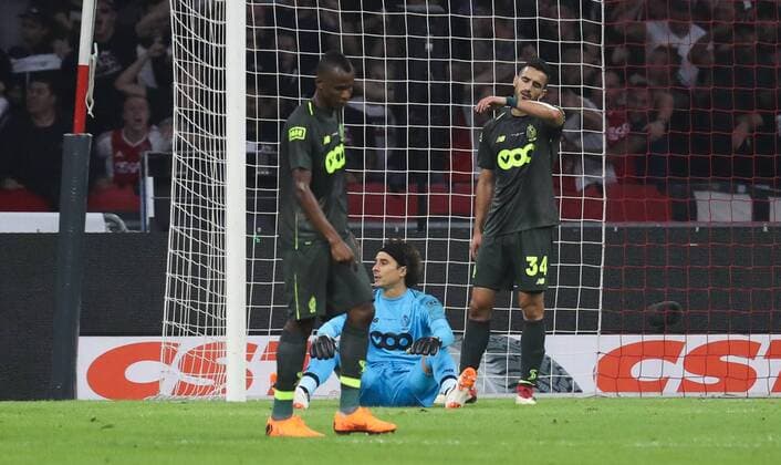Standard s Guillermo Ochoa looks dejected during a soccer game between Dutch club AFC Ajax and Belgian team Standard de Liege, Tuesday 14 August 2018 in Amsterdam, the Netherlands, the return leg of the third qualifying round of the UEFA Champions League. The first leg resulted in a 2-2 draw. VIRGINIExLEFOUR  x05405874x