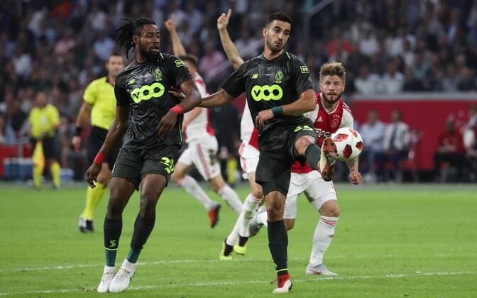 Standard s Konstantinos Laifis fights for the ball during a soccer game between Dutch club AFC Ajax and Belgian team Standard de Liege, Tuesday 14 August 2018 in Amsterdam, the Netherlands, the return leg of the third qualifying round of the UEFA Champions League. The first leg resulted in a 2-2 draw. VIRGINIExLEFOUR  x05405880x
