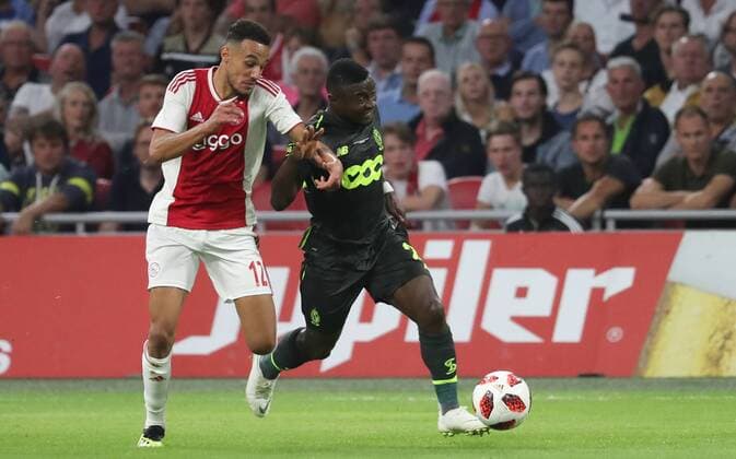 Ajax Noussair Mazraoui and Standard s Collins Fai fight for the ball during a soccer game between Dutch club AFC Ajax and Belgian team Standard de Liege, Tuesday 14 August 2018 in Amsterdam, the Netherlands, the return leg of the third qualifying round of the UEFA Champions League. The first leg resulted in a 2-2 draw. VIRGINIExLEFOUR  x05405881x