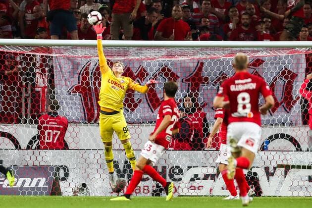 MOSCOW, RUSSIA - AUGUST 14, 2018: Spartak Moscow goalkeeper Alexander Maksimenko (L) makes a save in their 2018-19 UEFA Champions League third qualifying round match against PAOK Thessaloniki at Moscow s Otkritie Arena. Stanislav Krasilnikov TASS  TS08CC49