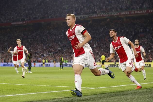 (L-R) Matthijs de Ligt of Ajax, Klaas Jan Huntelaar of Ajax, Daley Blind of Ajax during the UEFA Champions League third round qualifying second leg match between Ajax Amsterdam and Royal Standard de Liege at the Johan Cruijff Arena on August 14, 2018 in Amsterdam, The Netherlands UEFA Champions League 2018 2019 xVIxVIxImagesx xMauricexvanxSteenxIVx 11777306